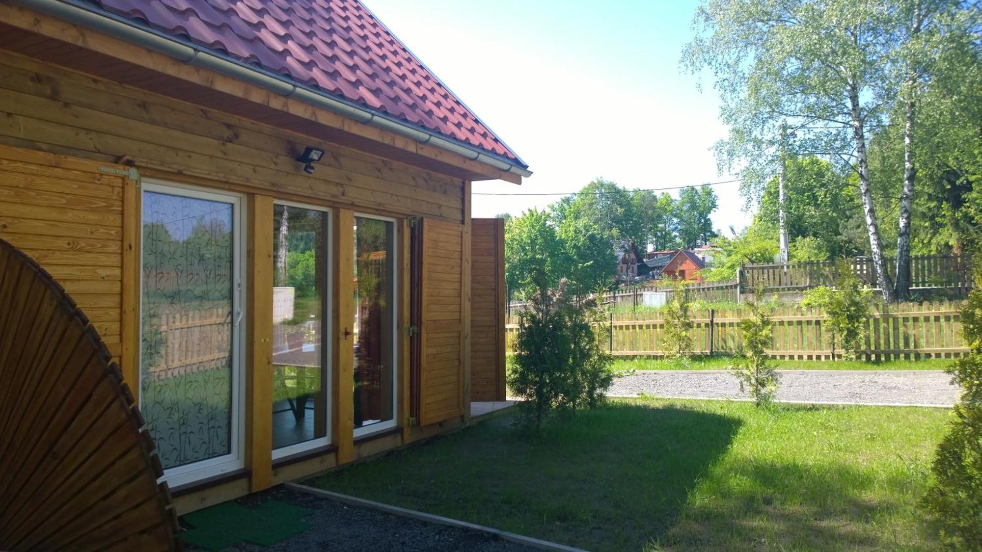 Domki Nad Jeziorem Karlowice Rum bild